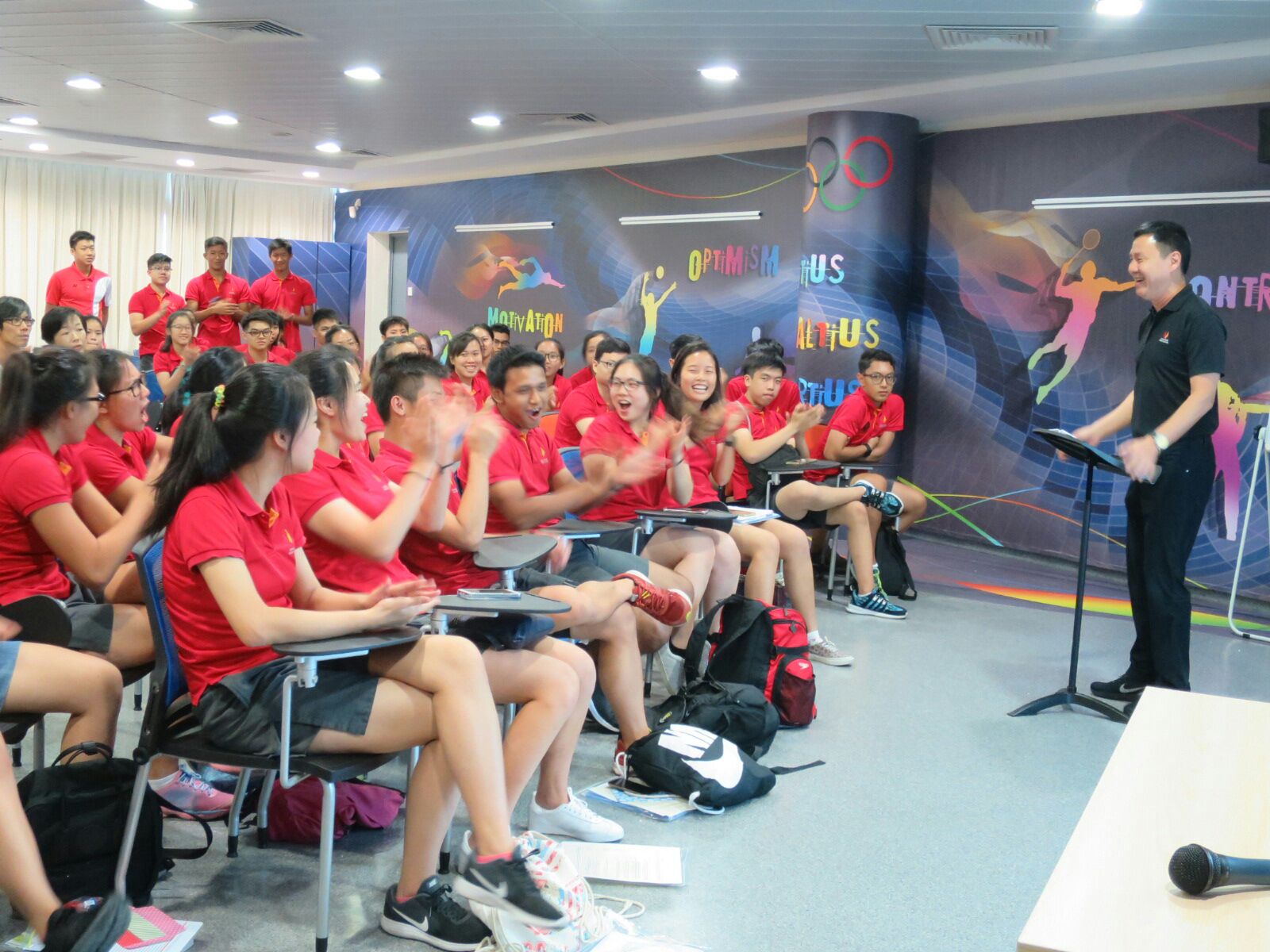 1 Singapore Sports School student-athletes are all cheers upon the announcement of their stellar results.jpg